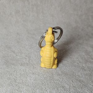 Vintage Tupperware Douglas Dirtwalker Yellow Dragon Dinosaur Keychain Key Ring